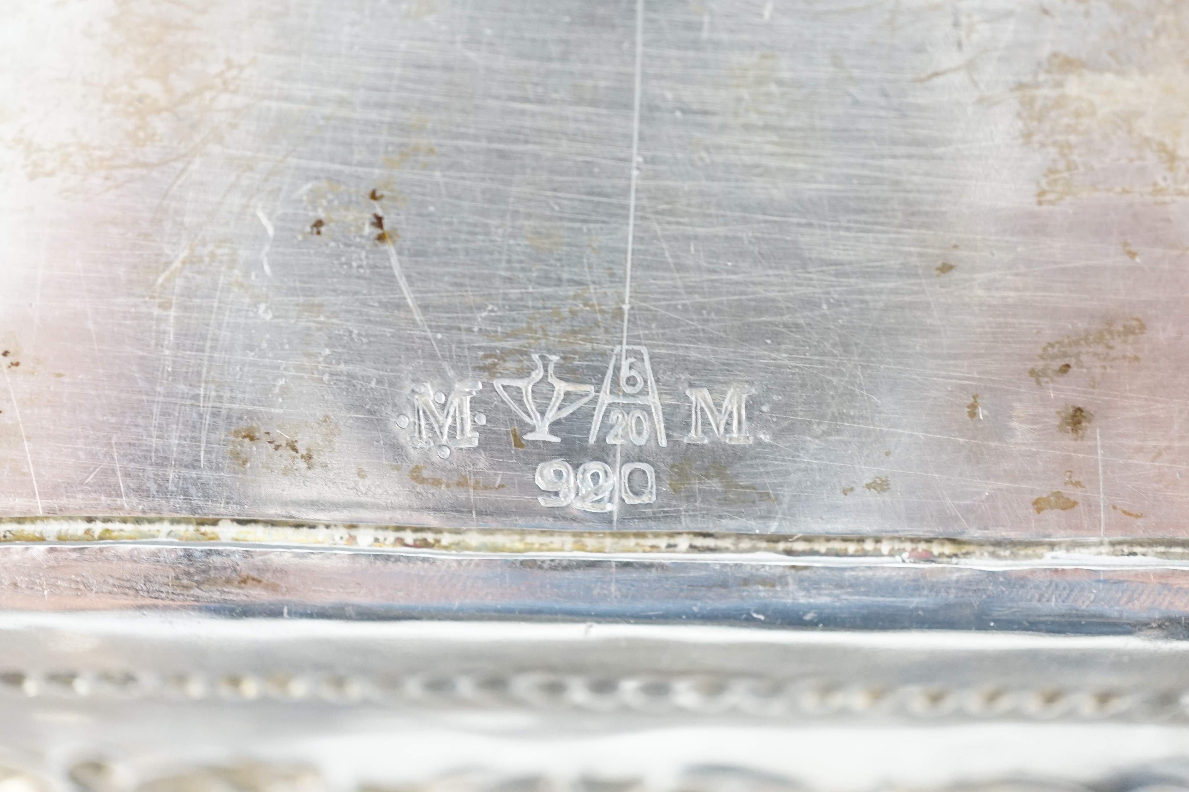 A 20th century Indian white metal rounded rectangular tea tray